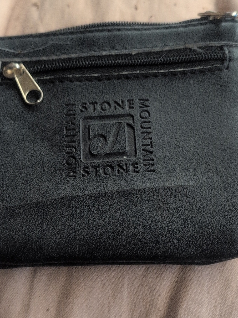 Stone Mountain Accessories Black Leather Men's Zip Pouch with Embossed Logo